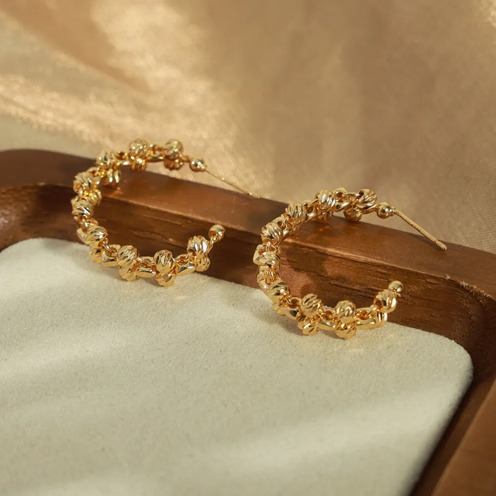 Boucles d’oreilles C-Hoop