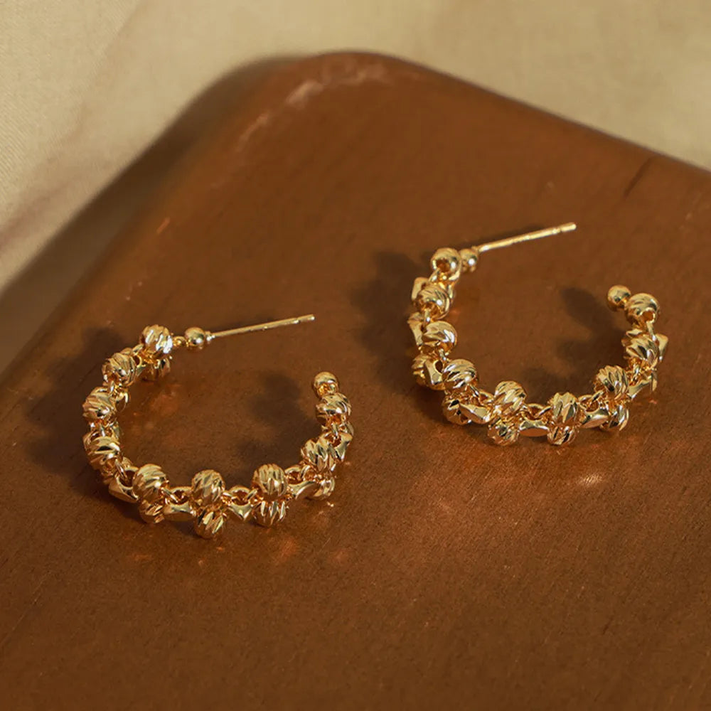 Boucles d’oreilles C-Hoop