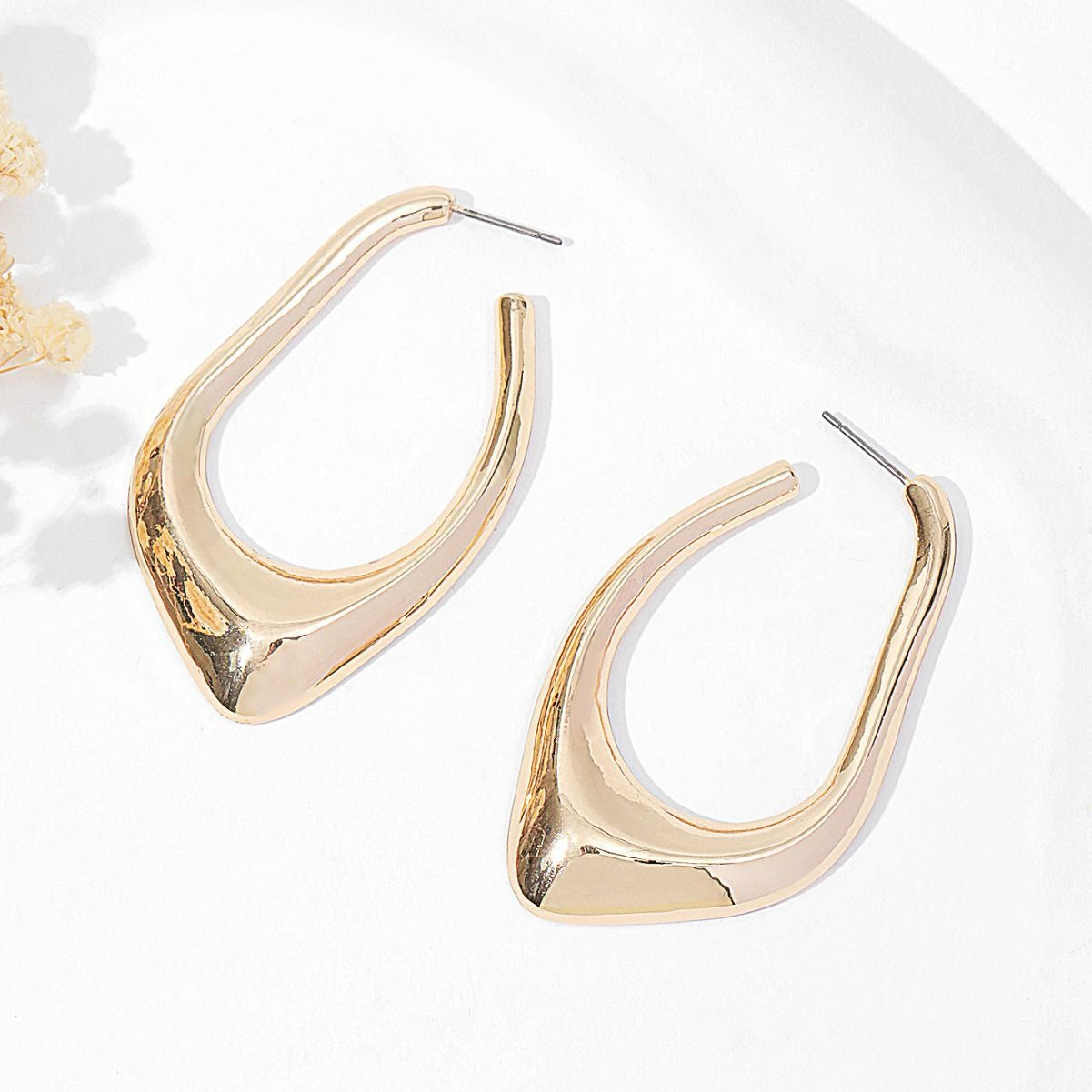 Boucles d’oreilles ajourées irrégulières