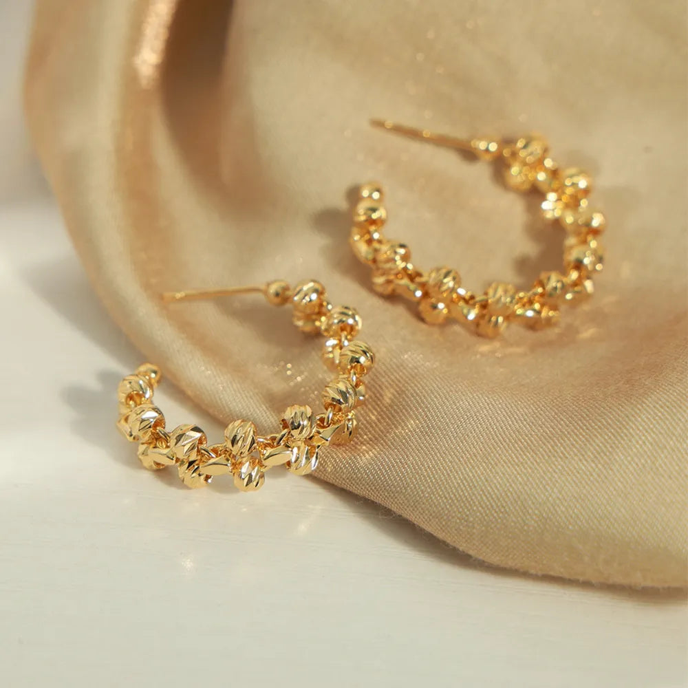 Boucles d’oreilles C-Hoop