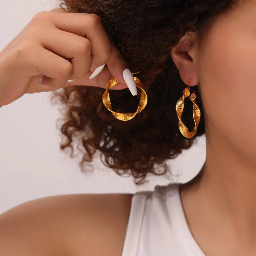 Boucles d’oreilles torsadées en Acier Titane
