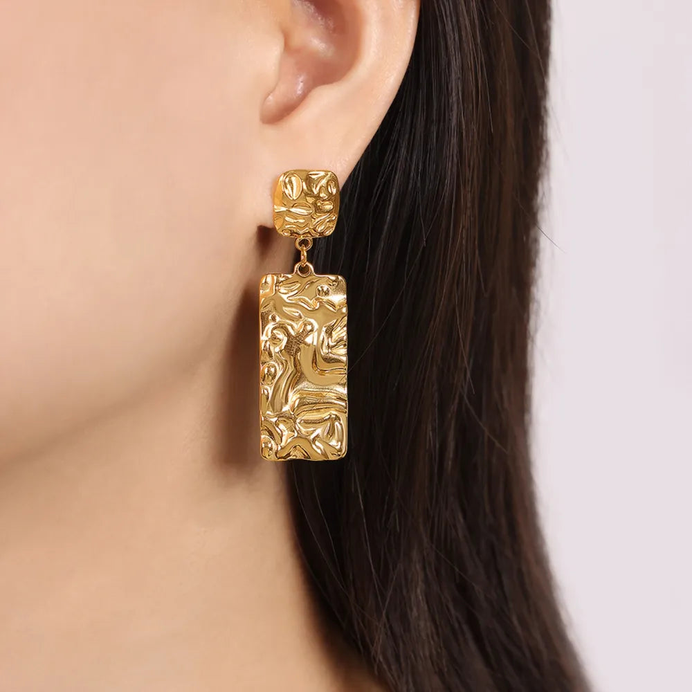 Boucles d’oreilles texturées en Titane Plaqué Or
